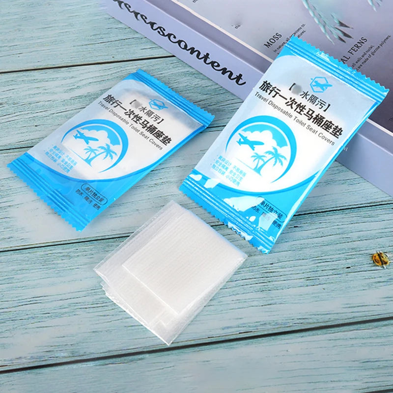 Toilet seat cover unfolded showing waterproof film